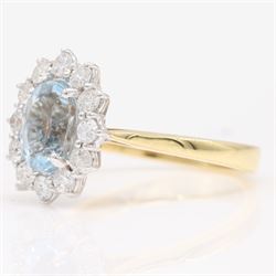 18ct gold aquamarine and diamond cluster ring, single oval cut aquamarine of approx 1.25 carat, surrounded by twelve round brilliant cut diamonds, hallmarked, total diamond weight approx 0.30 carat