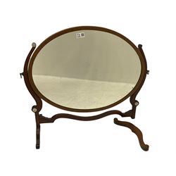 Early 20th century oval mahogany dressing table mirror (W82cm), a similar dressing table mirror, and two small 19th century swing mirrors (4)