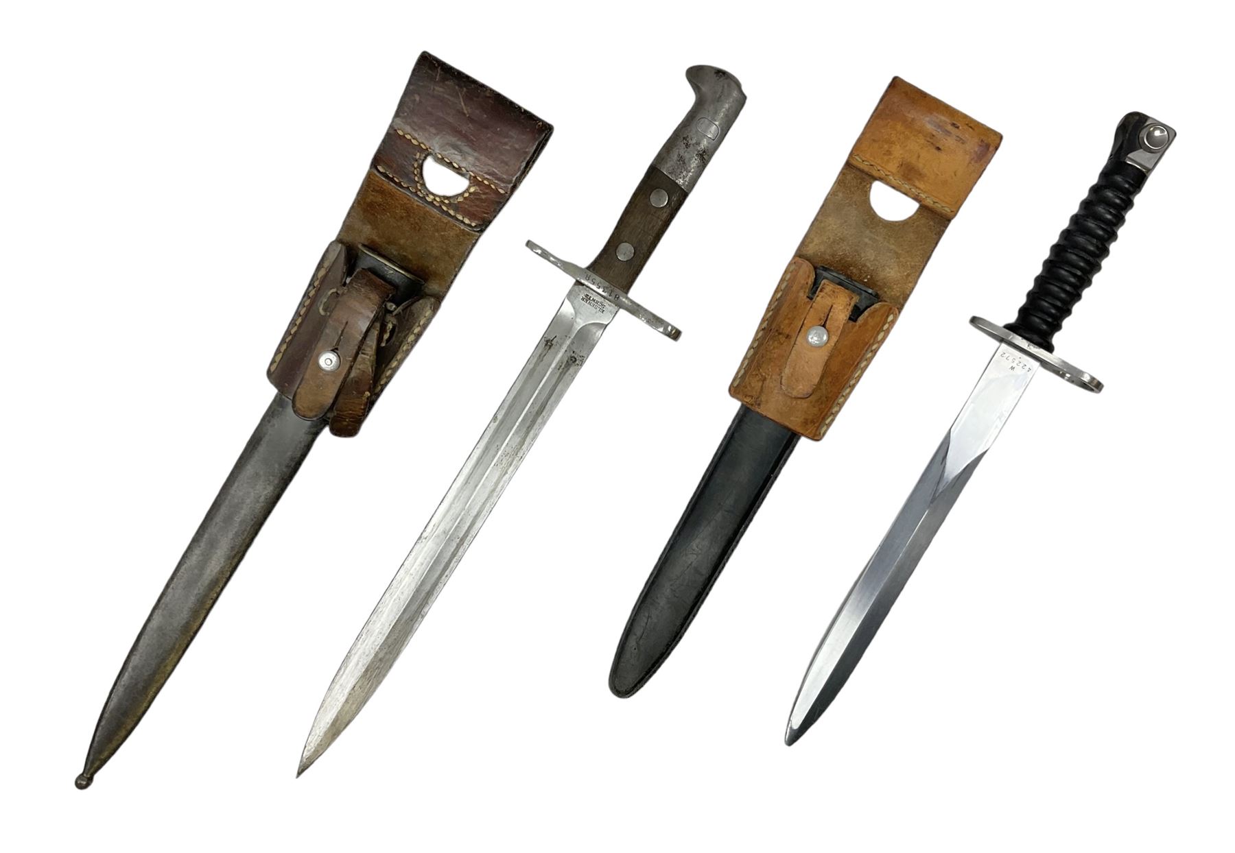 Schmidt-Rubin Model 1918 bayonet, the 30cm steel blade marked Elsener Schwyz, cross-piece numbered 813558; in steel scabbard with leather frog stamped E. Banga Sattler Selzac 67 L45.5cm overall; and Swiss Model 1957 SIG rifle bayonet by Wenger; in plastic scabbard with leather frog stamped E. Walty Sattlerei Baretswil 84 (2)