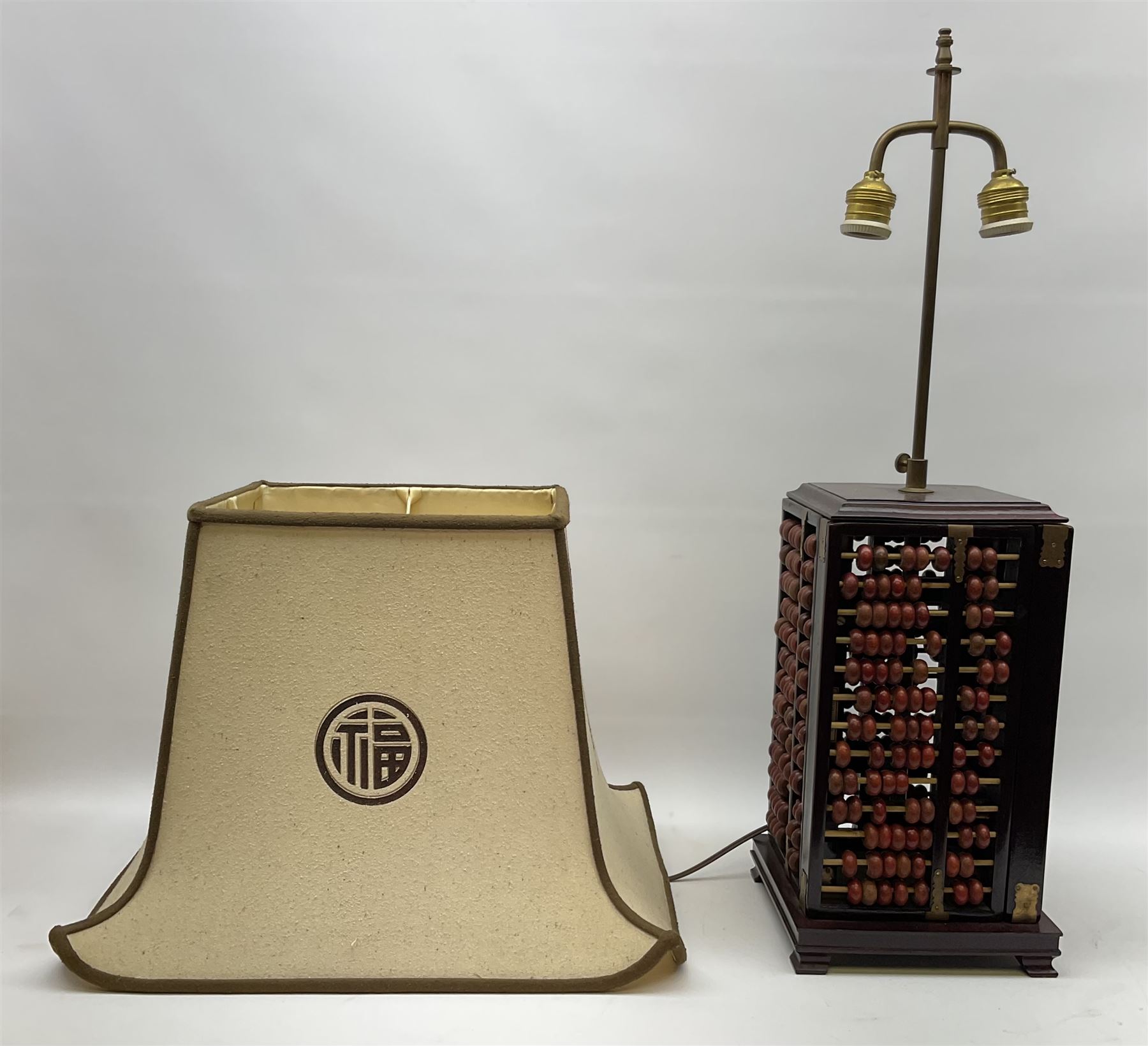 Vintage Chinese abacus table lamp, with double light fitting, and cream fabric shade decorated with characters, overall H73cm