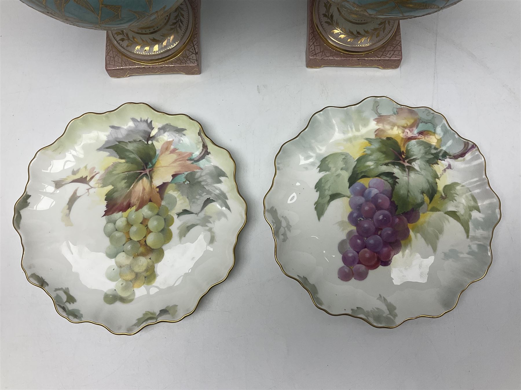 Pair rubian art pottery jugs and pair painted Doulton plates, jugs H42cm