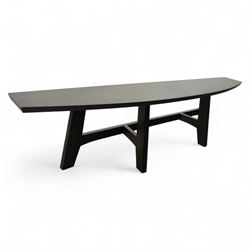 Contemporary black ash finish engineered wood hall table, with bow front top raised on a trestle style base 