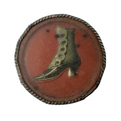 Beverley - 1920s promotional/advertising 'palm-of-your-hand' dexterity puzzle for Woods Boot Stores, Toll Gavel, Beverley of drum shaped form with glass top and bottom and tin-plate rim enclosing a model of a boot with rolling balls for the buttons D4.5cm