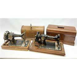 Two vintage sewing machines, the first marked Federation, in mahogany case, the second marked Singer, in oak case. 