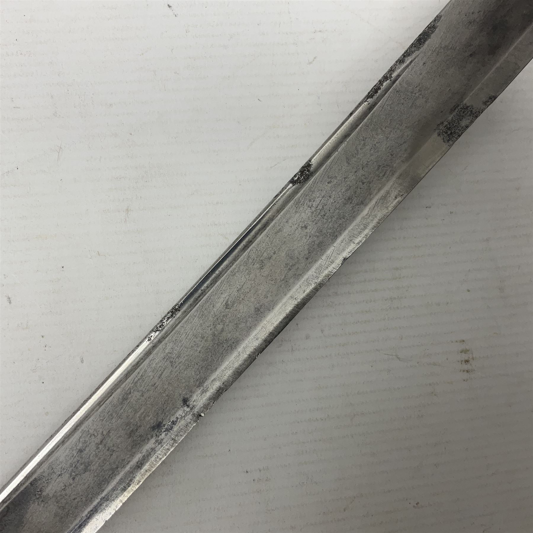 Late 18th century French 1st Empire Troupe a Pied Petit Montmorency Branch Tournante officer's sword, with 72.5cm slightly curving fullered blade, pierced brass hilt with lockable swivelling bar, fully wire-bound grip with lion head pommel, L88cm overall (no scabbard)