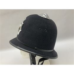 British Transport Police Custodian helmet with Queen's Crown plate; Hiatt & Co ebonised hardwood patrol truncheon; and pair of Hiatts 1960 hand-cuffs (3)