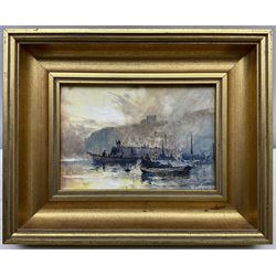 Robert Leslie Howey (British 1900-1981): Cobles off Tate Hill Pier Whitby, oil on canvas board signed 11cm x 16cm