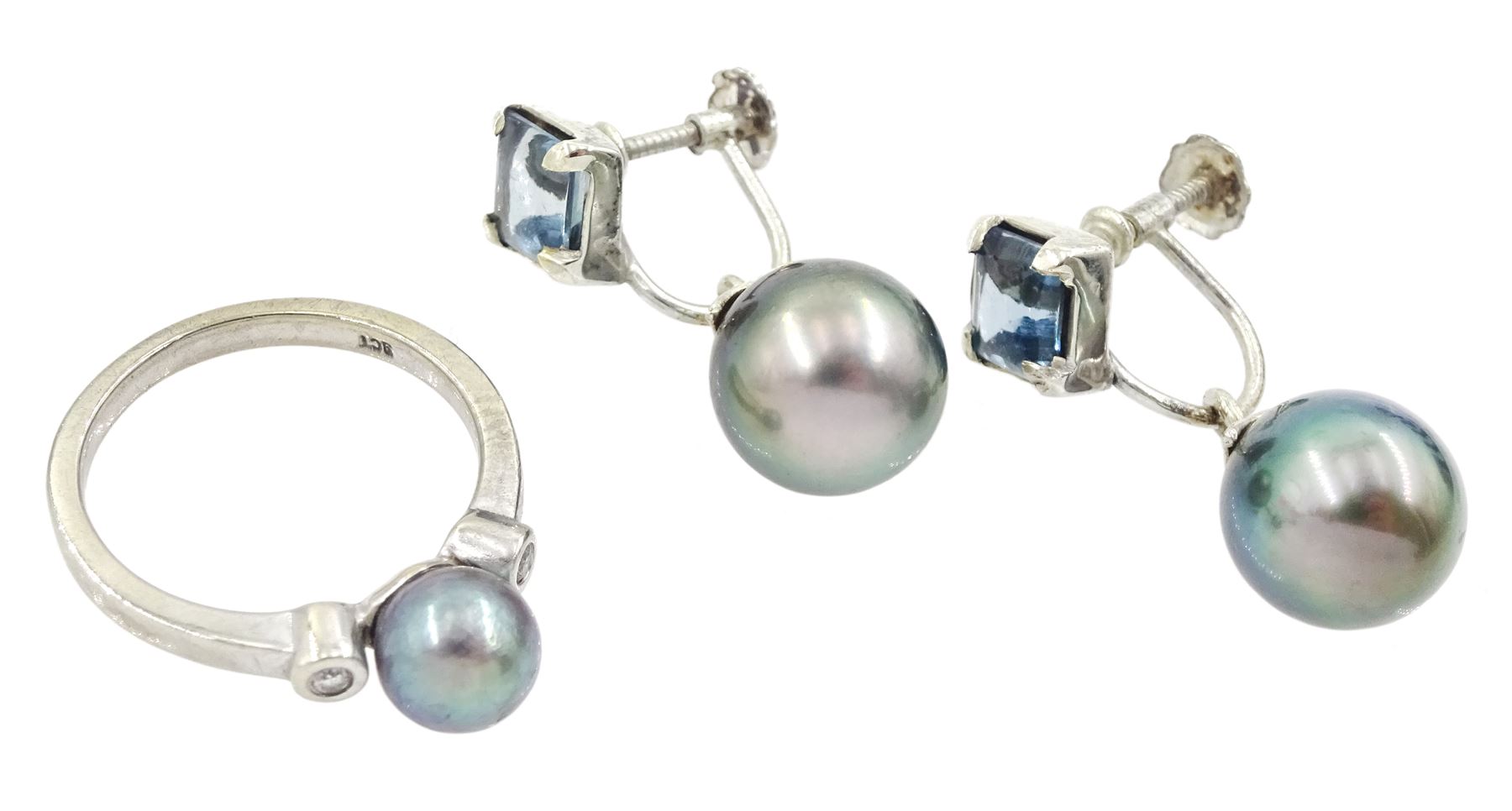 9ct white gold three stone black cultured pearl and diamond ring, hallmarked and a pair of 9ct gold black cultured pearl and cushion cut blue topaz pendant screw back earrings, stamped 375