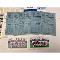 West Ham United - eight 1940s/50s home programmes for 1947/48 - 1951/52 and another for 1986/87 and two team photographs; together with eight Tottenham Hotspur home programmes 1952/53 - 1976/77 (17)