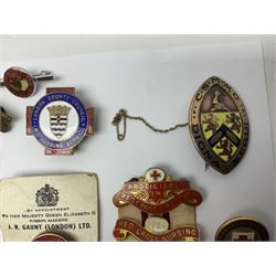 Collection of St John Ambulance enamel and metal badges, together with Red Cross medals and badges