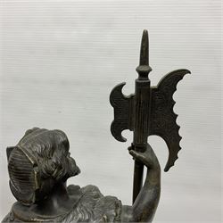 Pair of bronzed figure modelled as a hunter in traditional dress, each holding a pike, H48cm