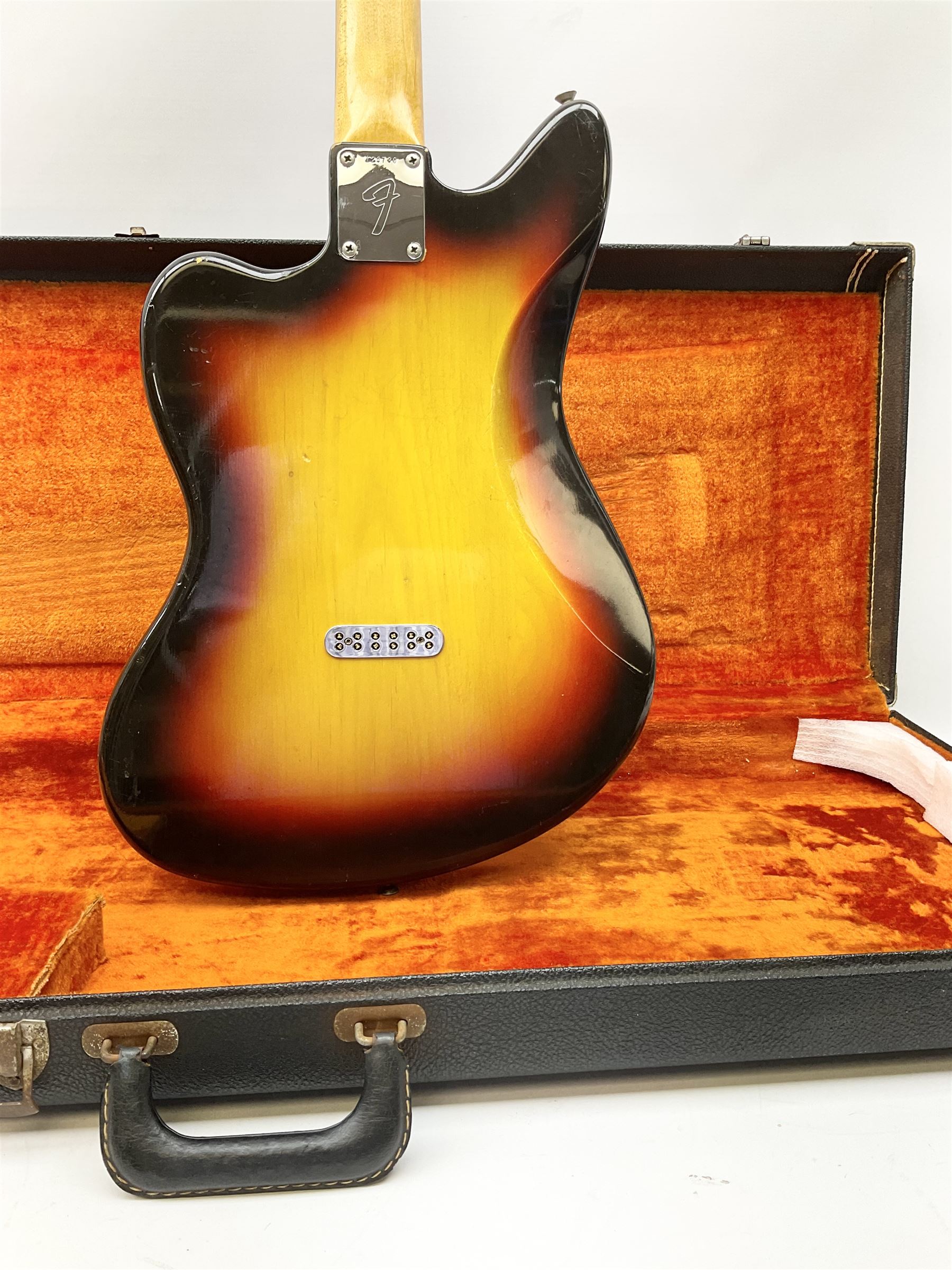 Fender three-tone Sunburst 12-string electric guitar c1965/6 Fullerton USA, with alder body and maple neck, the Indian rosewood fretboard with twenty-one frets and pearloid dot markers, fender electric XII bridge, F-stamp tuners (non-original), two split single coil pick-ups, master volume and tone and four-way switch, serial no.129730, L108cm; in original Fender case bearing label for Rivington Guitars New York with copy of original invoice; together with GuitarKes set-up and service certificate dated October 2021
