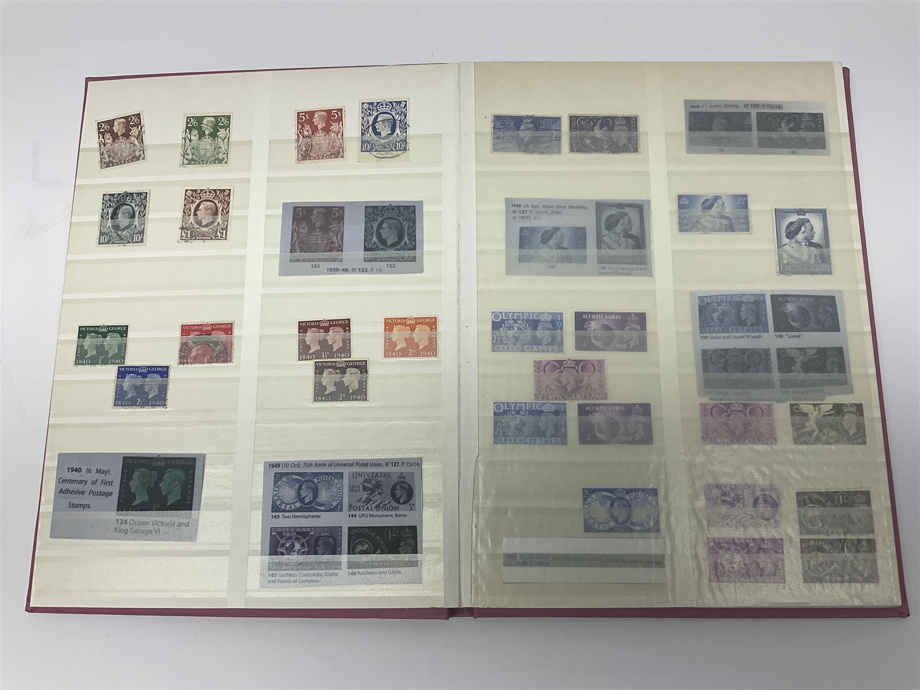 Mostly Great British stamps, including King Edward VII two shillings and sixpence, five shillings and ten shillings, King George V seahorses, King George VI high values, Queen Elizabeth II pre and post decimal etc, housed in a pink stockbook 