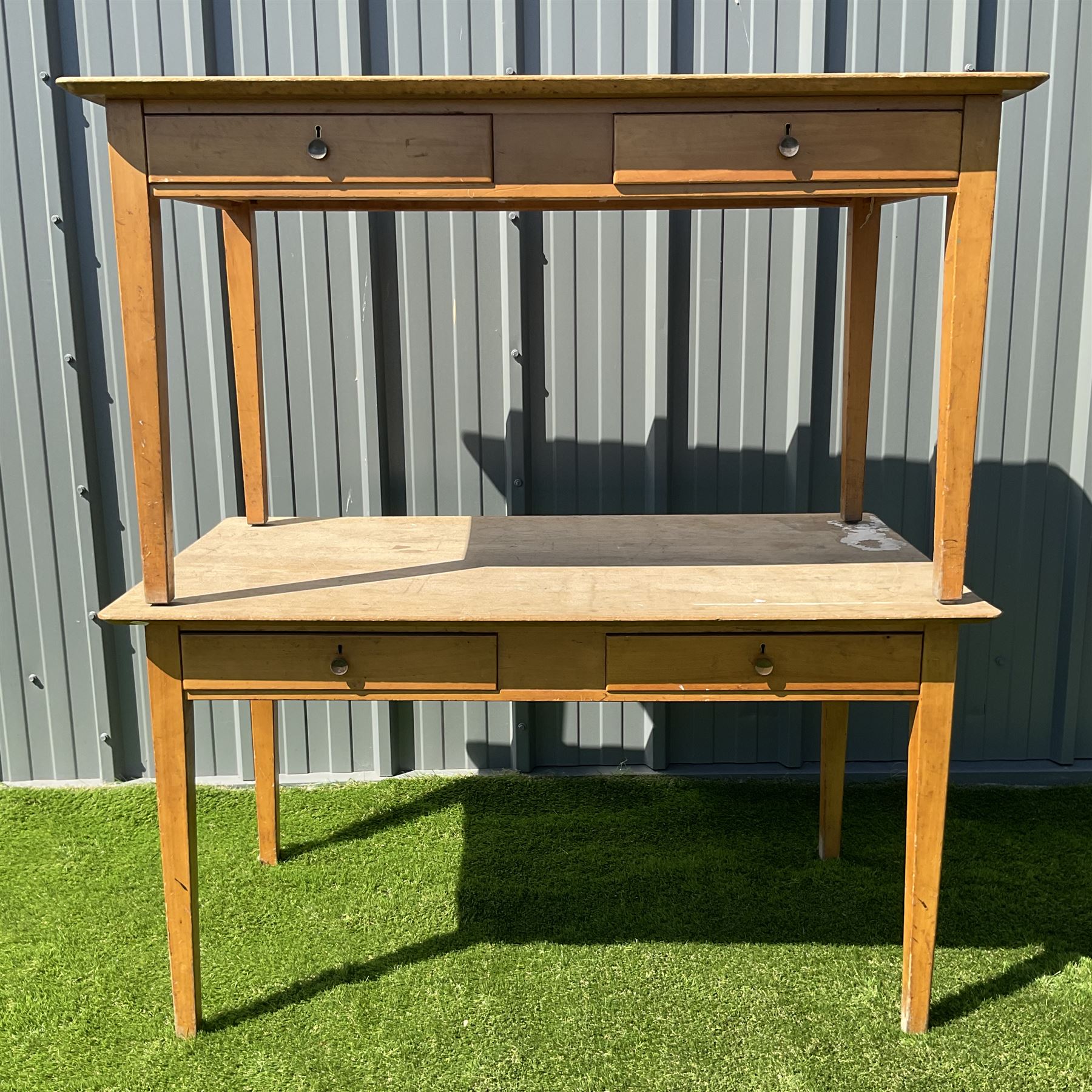 Pair of solid beech wood desks, with two drawers THIS LOT IS TO BE