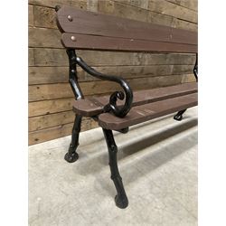 20th century tree cast iron and timber slatted garden bench, black painted frame with stained wood