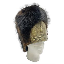 French Grenadier's bearskin hat, the embossed brass plate with crowned eagle, flaming grenades and arrow flashes; leather headband and traces of manuscript label internally