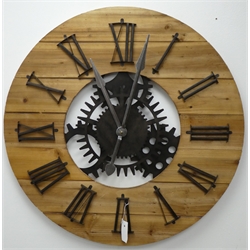  Large circular planked pine wall clock with Roman numerals, skeleton simulated workings with battery movement, D80cm  