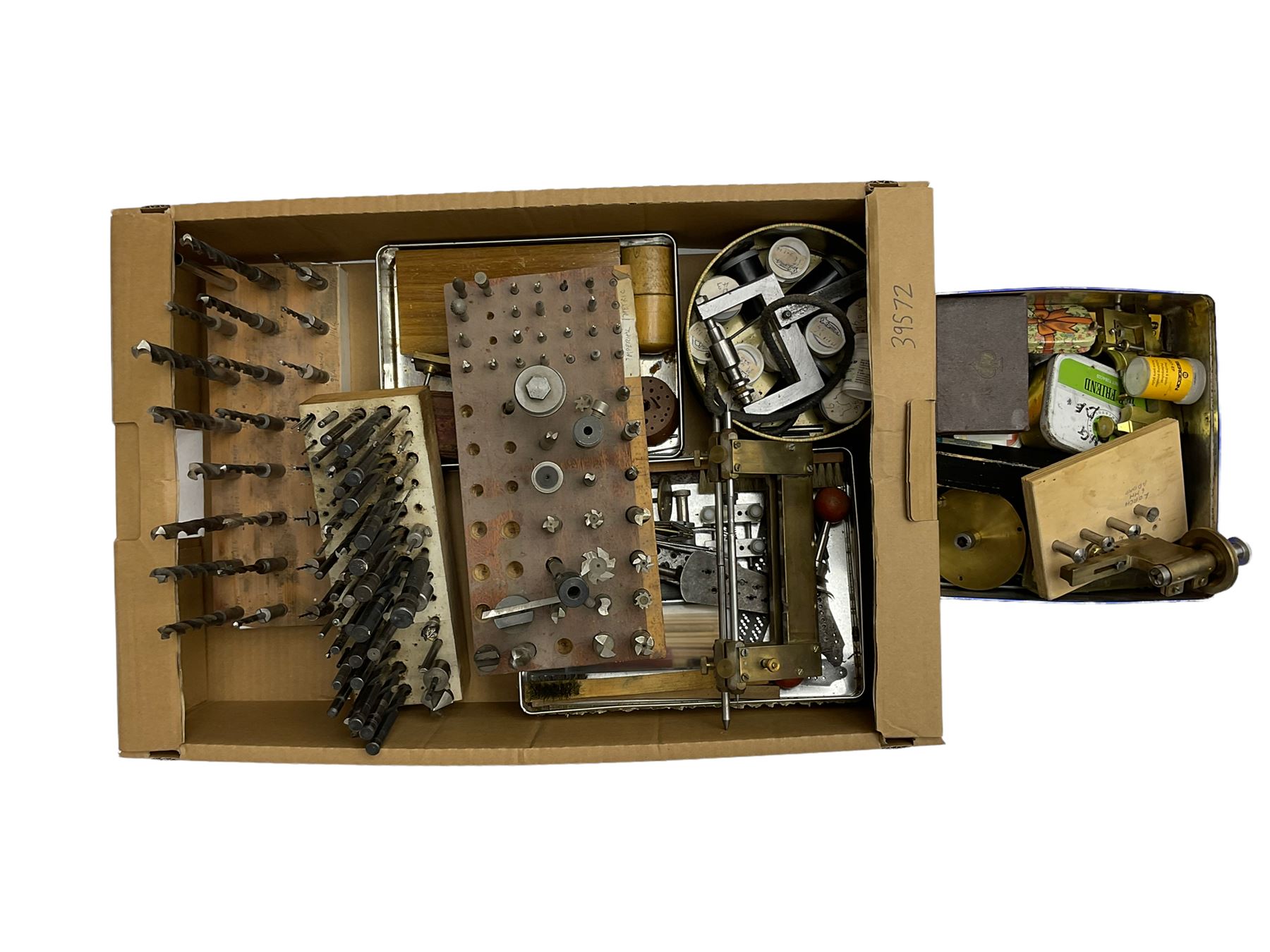 Assorted lathe drills, milling cutters, fly cutter frame and spindle with various fly cutters, clock depthing tool, other miscellaneous lathe and clockmaking hand tools.