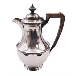 1930's silver hot water pot, of faceted baluster form with engraved dedication, and wooden handle and finial, hallmarked Harrison Brothers & Howson, Sheffield 1930, H20cm, approximate gross weight 15.66 ozt (487.2 grams)