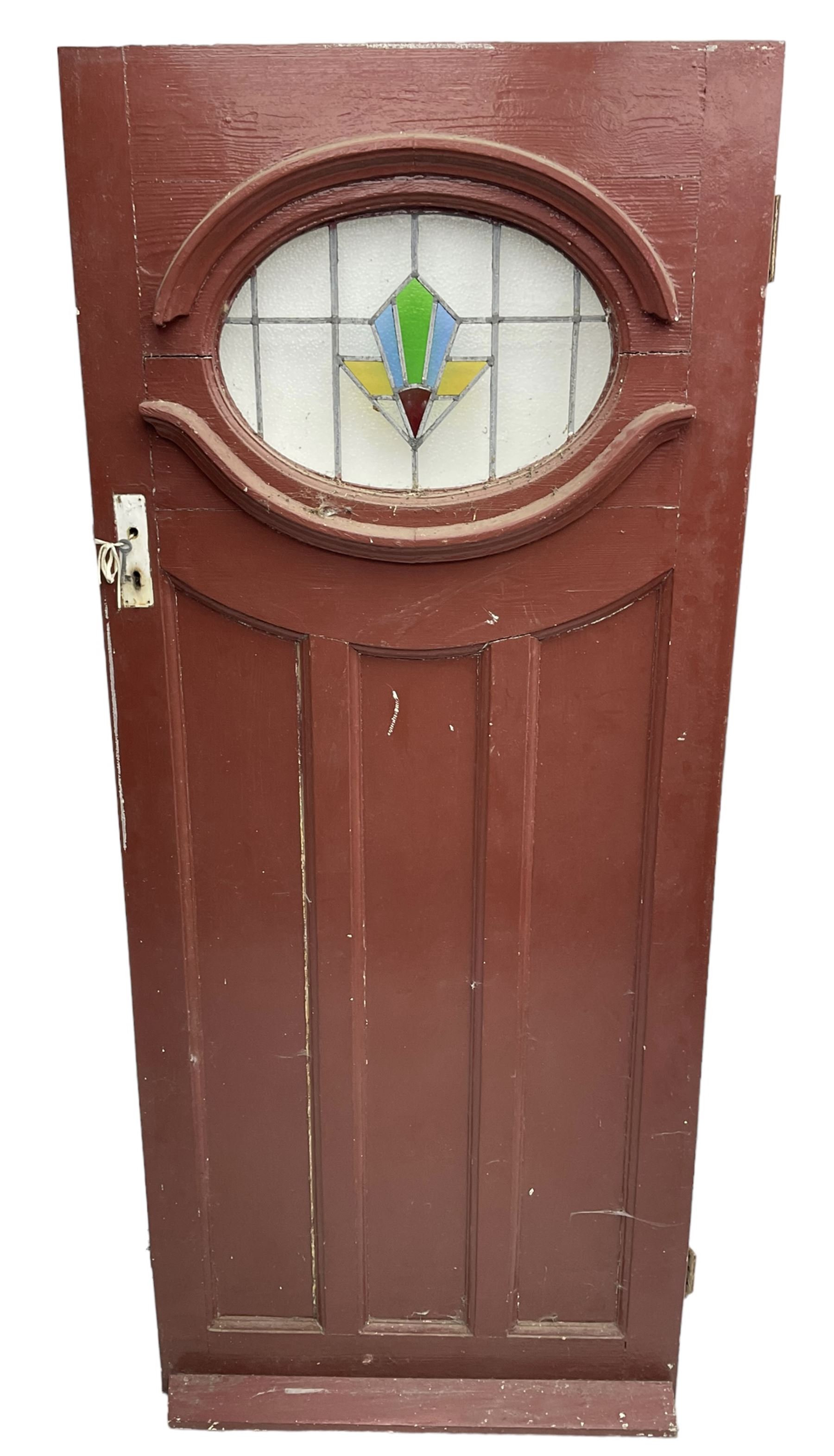 1930s external door with stained leaded glass panel (86cm x 203cm), six small stained glass windows in wooden frames (W52cm); and various loose stained leaded glass panels