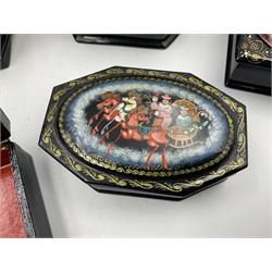 Six 20th century Russian black lacquered papier Mache boxes, all decorated with horses, largest D13cm
