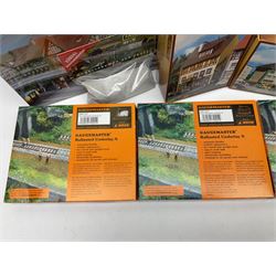 'N' gauge trackside accessories - seven Faller buildings and bridges etc Nos.N212113, N222121, N222583, N222174, N222128, Z282730 & Z282707; two others by Vollmer Nos.N7657 & N7724; four boxes of Gaugemaster Ballasted Underlay; grit and Foliage Clusters