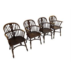 Late 20th century set four oak Windsor elbow chairs, double hoop and stick back with pierced and fretwork work splat, dished seat on turned supports joined by crinoline stretcher 