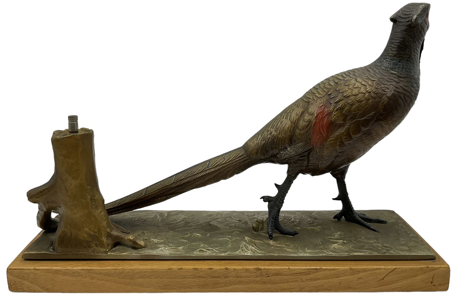 Austrian cold painted spelter table lighter modelled as a pheasant beside a tree stump, on rectangular oak plinth, L31.5cm x H21cm 