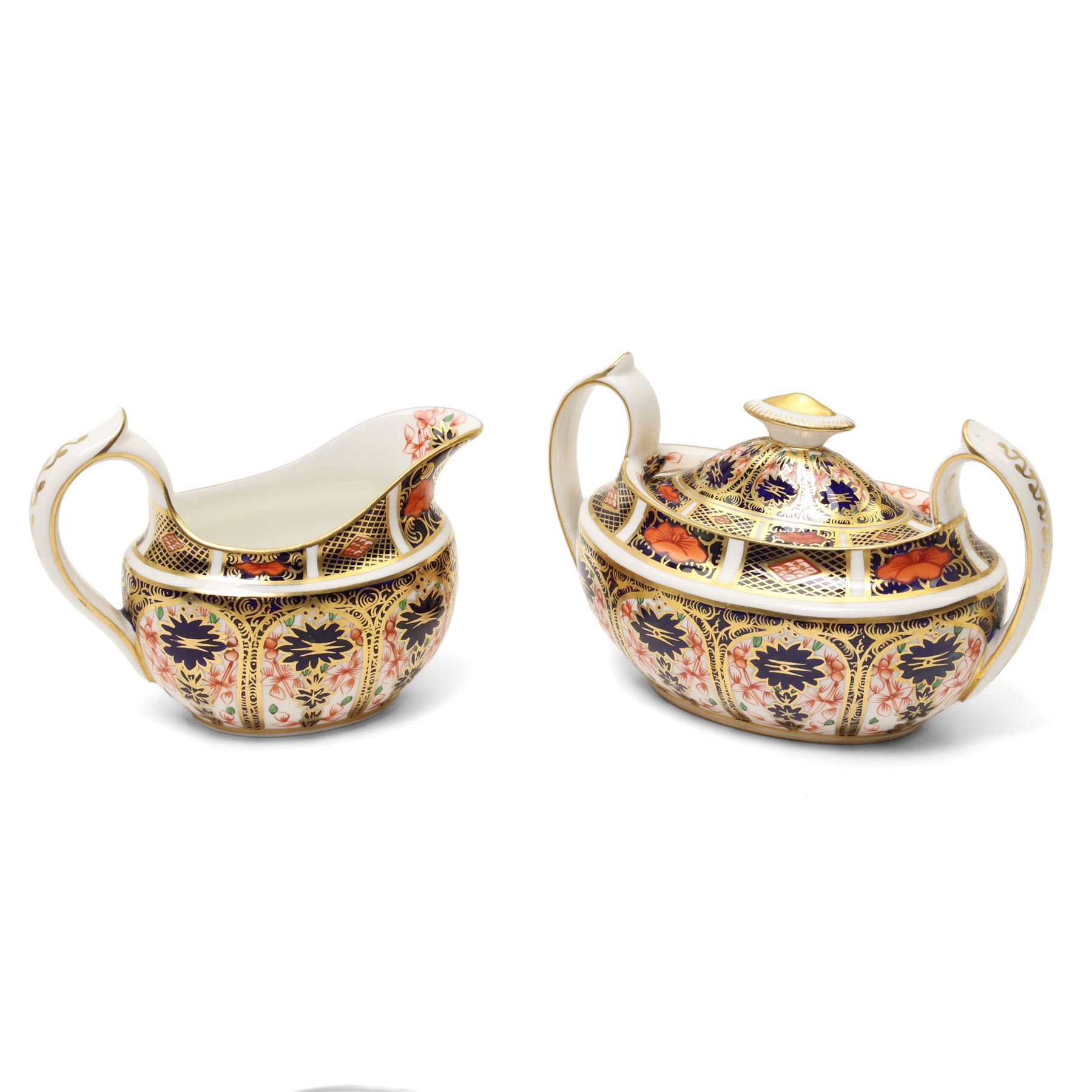 Royal Crown Derby pattern 1128 wares, comprising covered sucrier, milk jug, pair of coffee cans and saucers, teacup and saucer two small plates (D18cm) and one dinner plate 