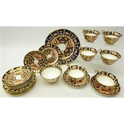  Set of six Royal Crown Derby Imari pattern cups and saucers, five tea plates & sugar bowl no.2451, c1922, cake plate with shaped rim, c1923, matching saucer and one later tea plate (21)   