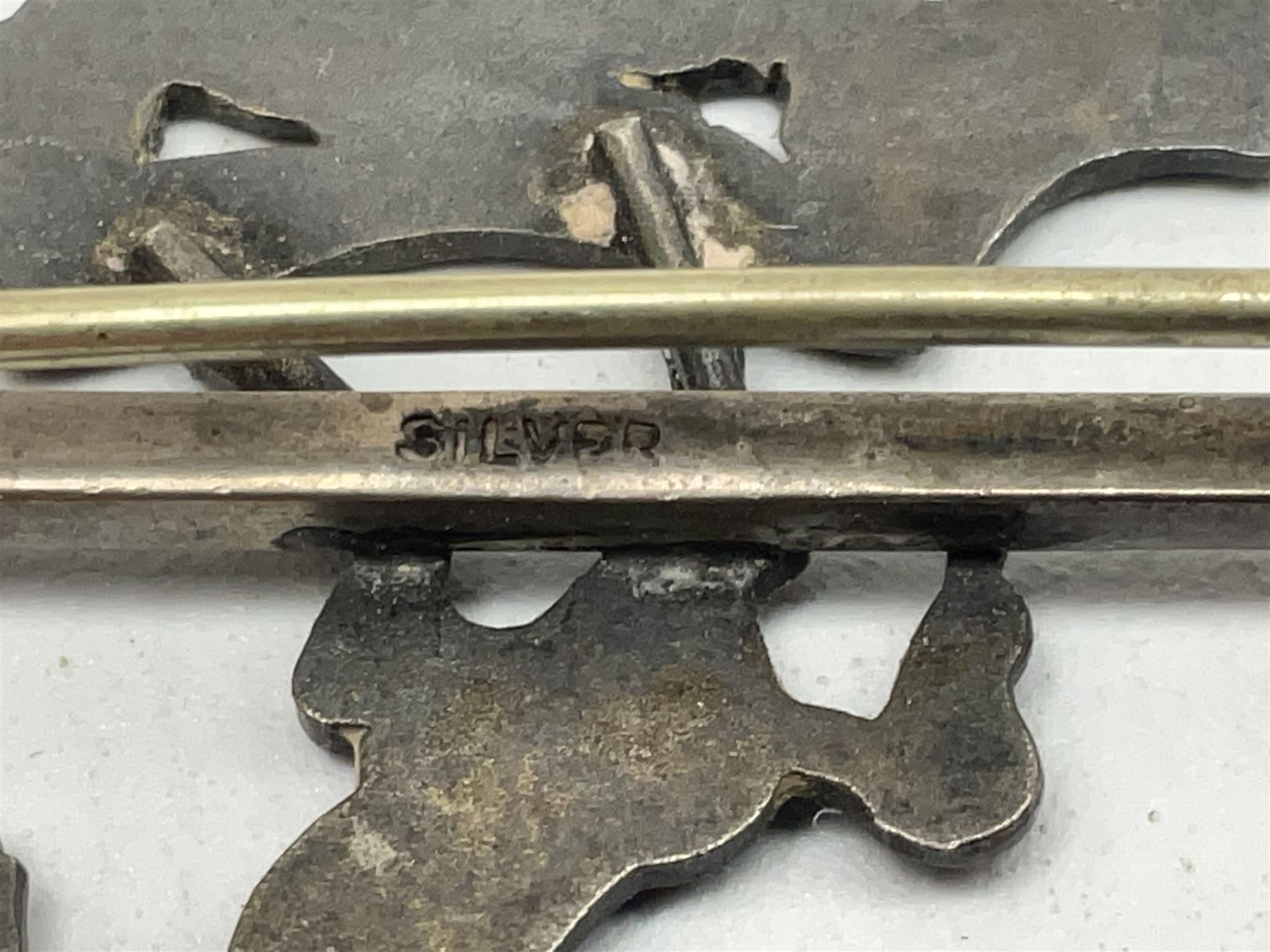 Royal West Kent regiment 9ct gold and enamel sweetheart brooch; The Queens Own regiment silver and enamel sweetheart brooch; and another sweetheart brooch for the Royal West Kent regiment (3)