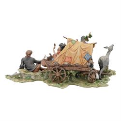 Capodimonte figural group of a gypsy encampment including wagon, cooking fire and people, H21cm