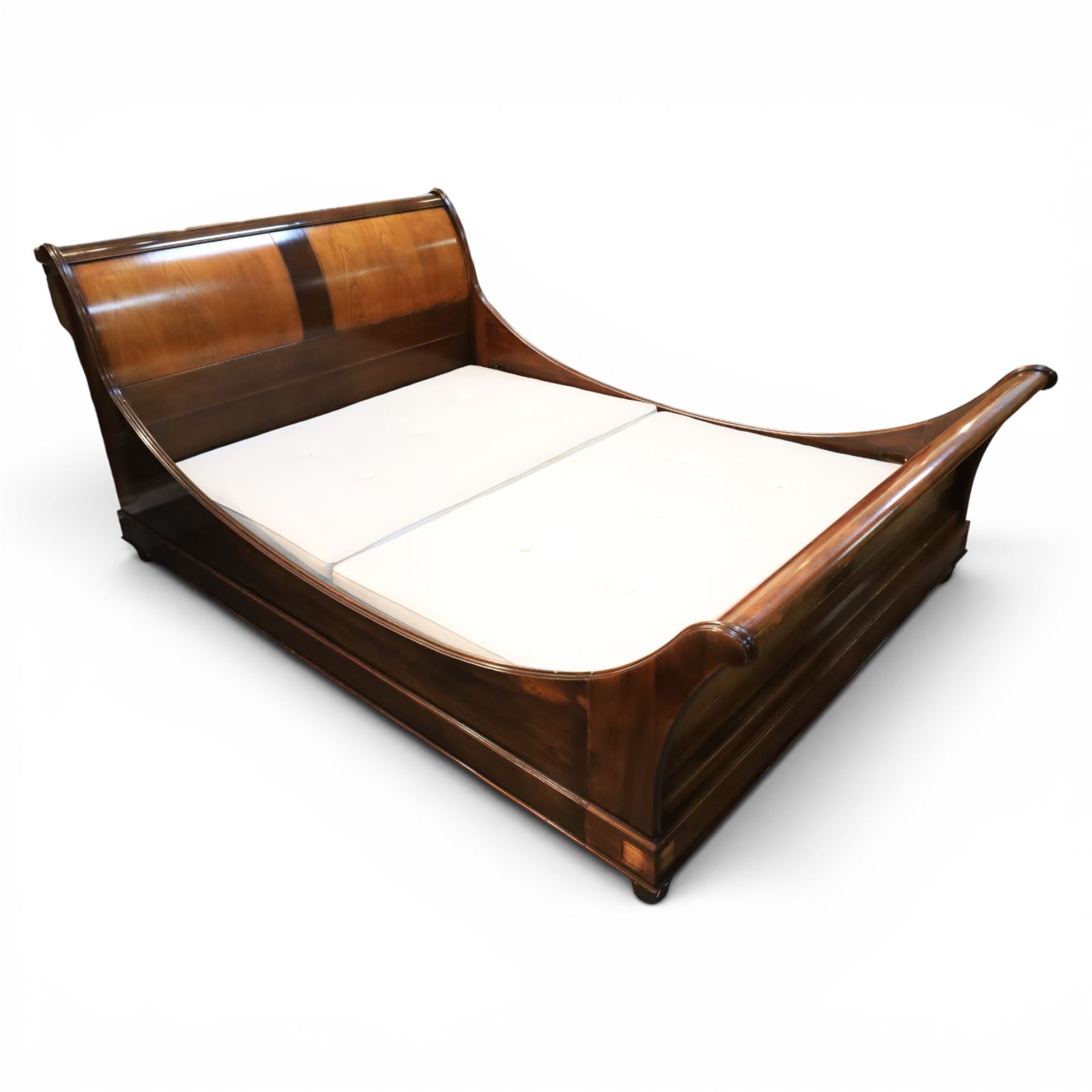 And So To Bed - 5' king size 'Palais' cherry wood sleigh bed, the cylindrical rolled head and foot rails over panelled boards with darker crossbanded detail, shaped scroll ends and moulded plinth base, with Vi-Spring divan base