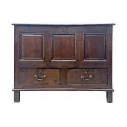 Early 18th century oak mule chest, hinged rectangular top above three recessed panels and two drawers, each fitted with brass drop handles, open interior fitted with candle box compartment, raised on square supports
