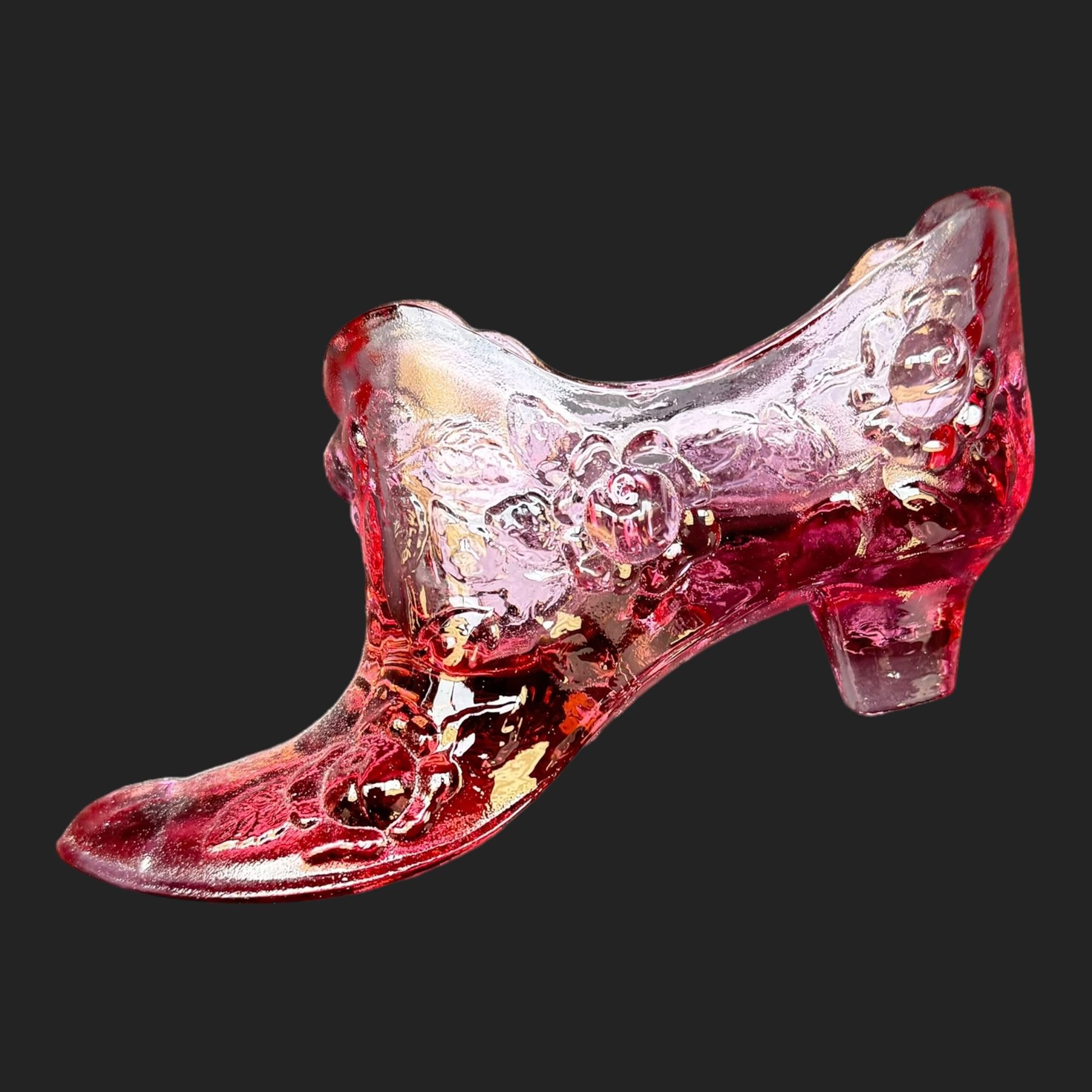 Jack in the Pulpit vase, with a Vaseline rim, together with a collection of cranberry glass, including enameled jars 