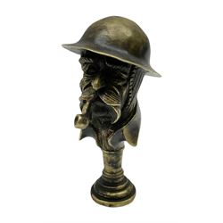 Bruce Bairnsfather 'Old Bill' style brass pipe tamper, the brim of the helmet inscribed 'YPRES' and the base 'WW1' H6.5cm
