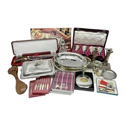 Silver plated Calibri lighter, in the form of a twin handled vase with mask handles, together with a pair of silver plated candle sticks, horn handled carving set with hallmarked silver ferrules and other silver plated items