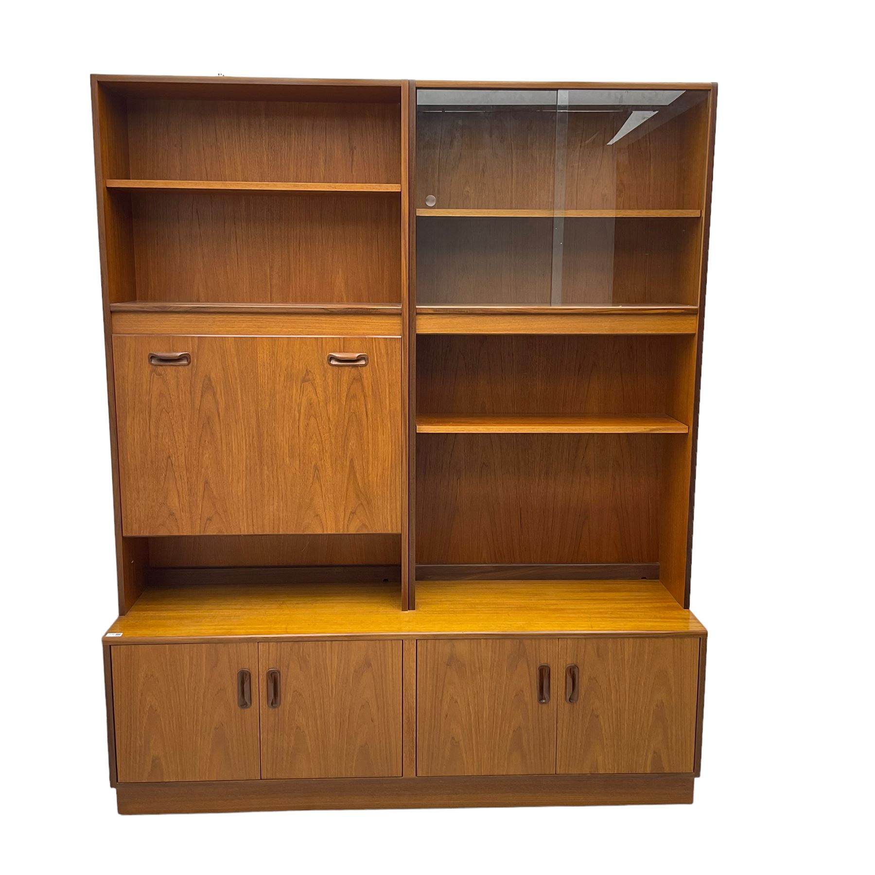 G-Plan - mid-20th century teak modular wall cabinet, fitted with shelves, display cabinet, fall front compartment and two double cupboards