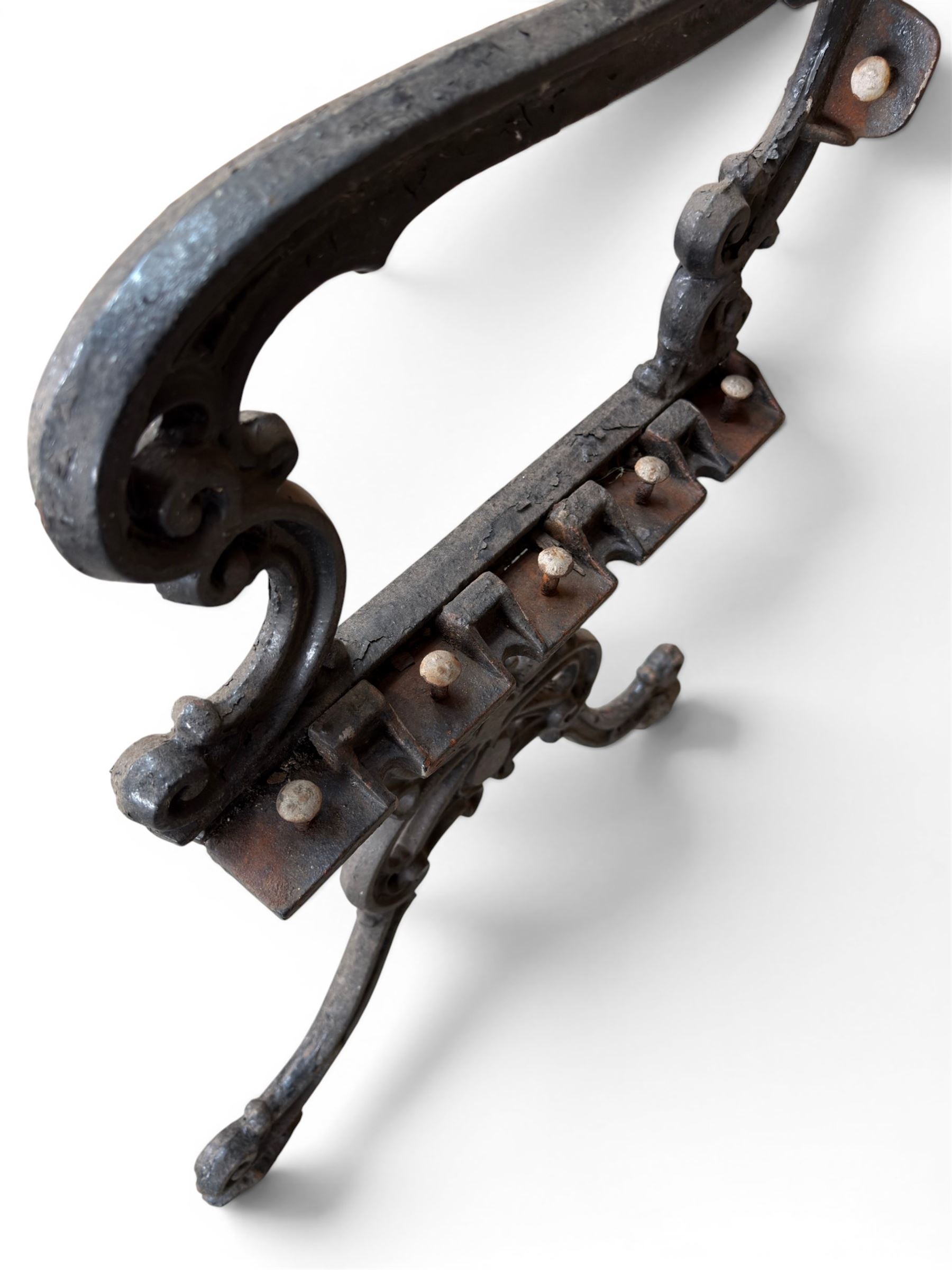 Carron Foundry - two pairs of 19th century cast iron garden bench ends, ornate detail with arms and X shaped legs,finish in black paint, the design no. 110396, first registered 13 July 1857 (see illustration), width as desired