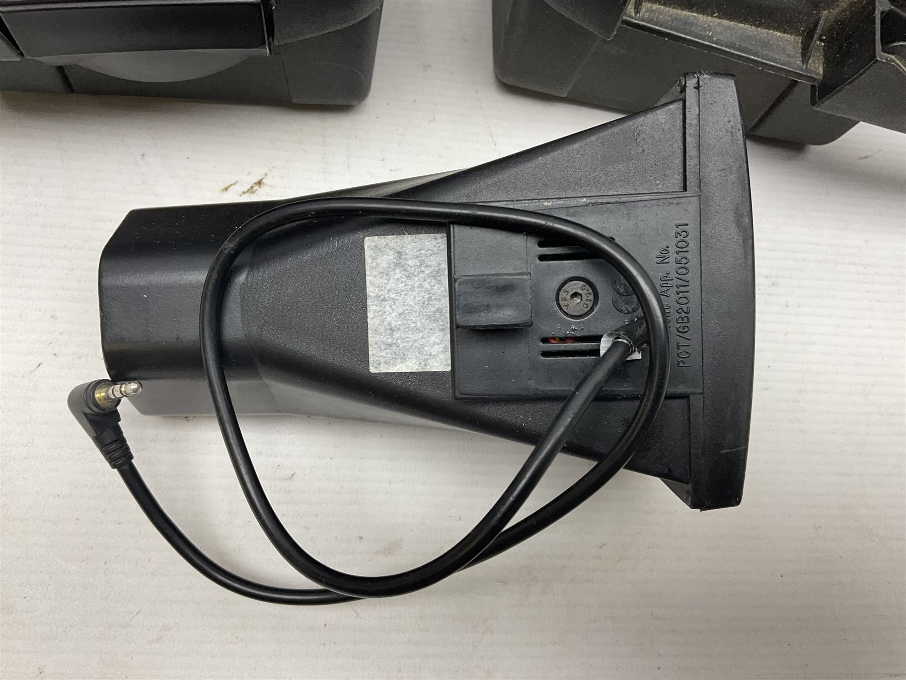 Two Nite-Site add-on kits in hard plastic carrying cases; one with charger