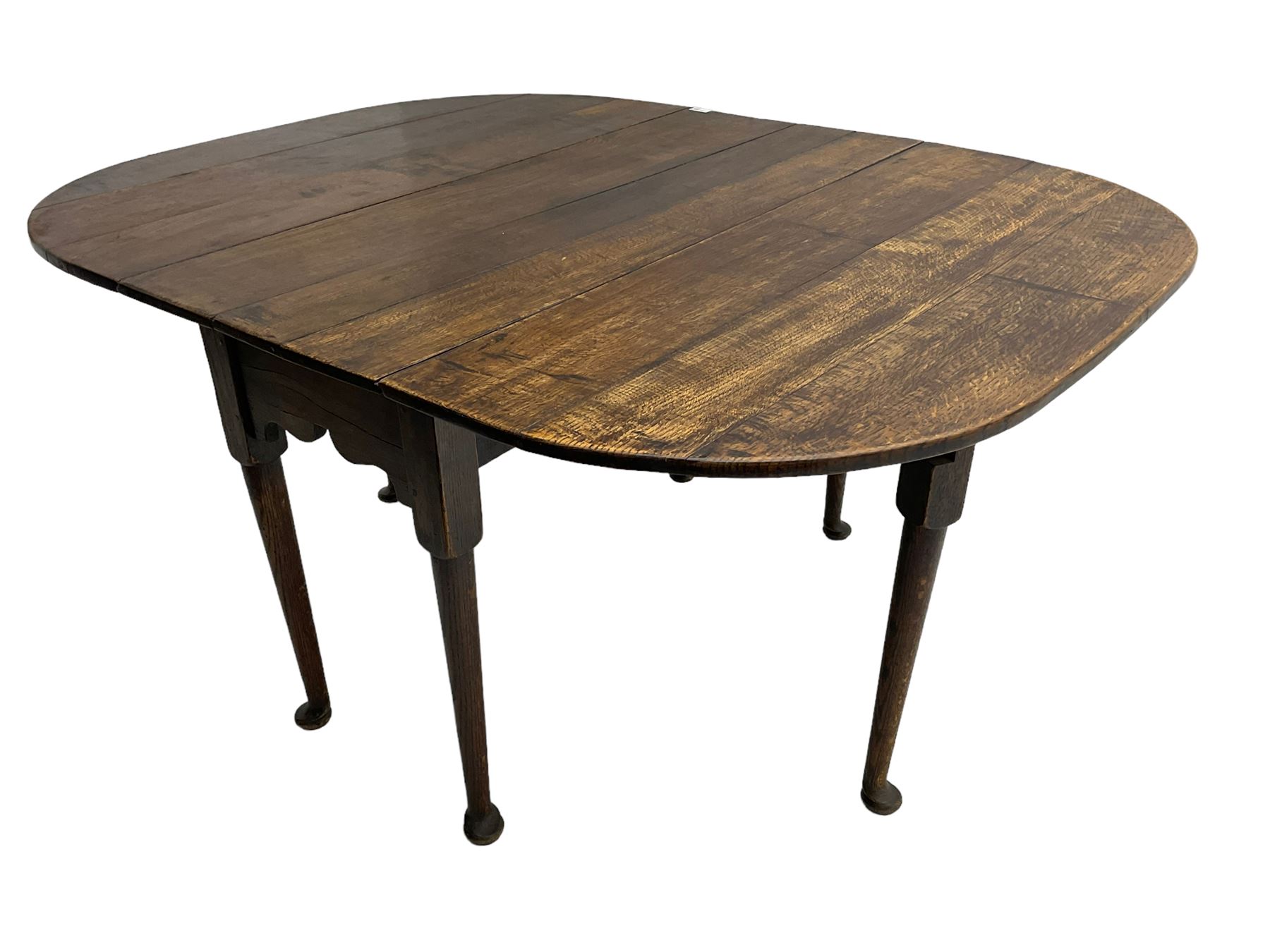 George III oak drop-leaf dining table, oval top over gate-leg action cabriole supports