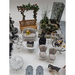 1:12 scale dolls house conservatory and garden accessories, including white wooden glazed conservatory on a stone effect base, black and white metal garden seating, barbecue, plant shelves, parasol, barbeque accessories, large planters, rabbit hutch, animals, chimenea, etc