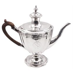 George III silver coffee pot, of vase form with part faceted sides and wooden scroll capped handle, the body engraved with central crest and finial border, hallmarked London 1796, makers mark partly worn and indistinct, H29.5cm, approximate gross weight 25.53 ozt (794.3 grams)