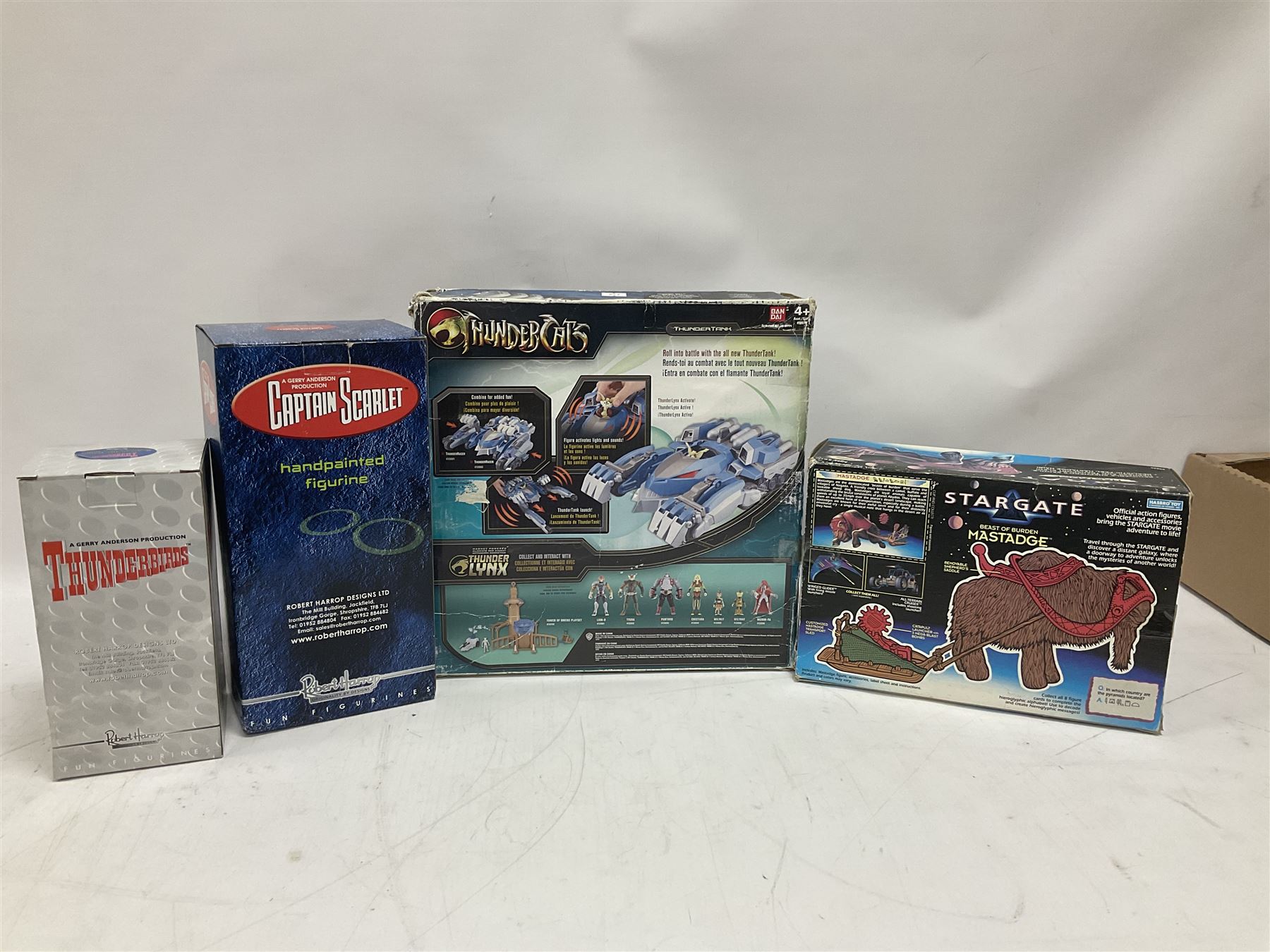 Miscellaneous toys to include Robert Harrop Fun Figurines of Captain Scarlet and Thunderbirds Braman the Robot; Thundercats Thundertank and Mumm-Ra; Stargate Mastadge Beast of Burden; various periodical issue metal figures for Star Wars, Buffy the Vampire Slayer, James Bond etc; all boxed (18)