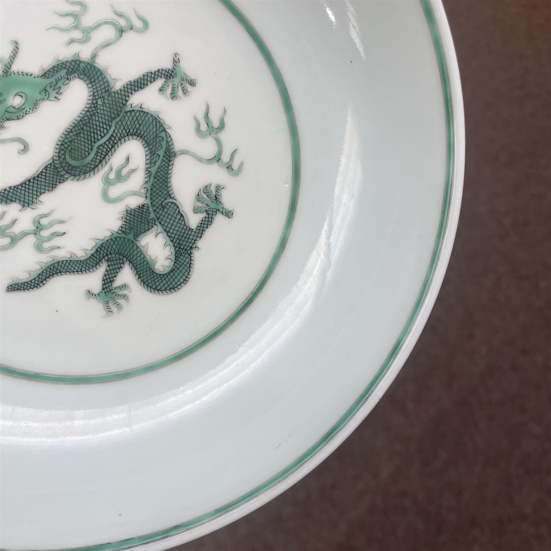 Chinese Guangxu period green and white bowl decorated with dragons on a scaled ground, character mark to base D18.5cm
