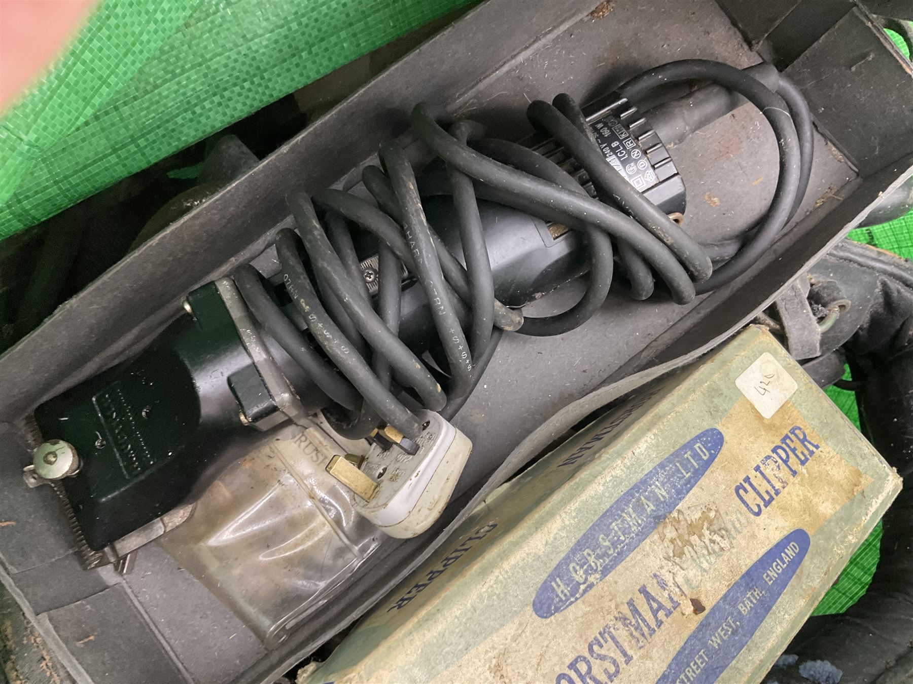 Quantity of horse tack and equipment to include Hauptner electric horse clippers, The Horseman Electric Clippers, bits, bridles, girths, rugs, jodpa boots etc  