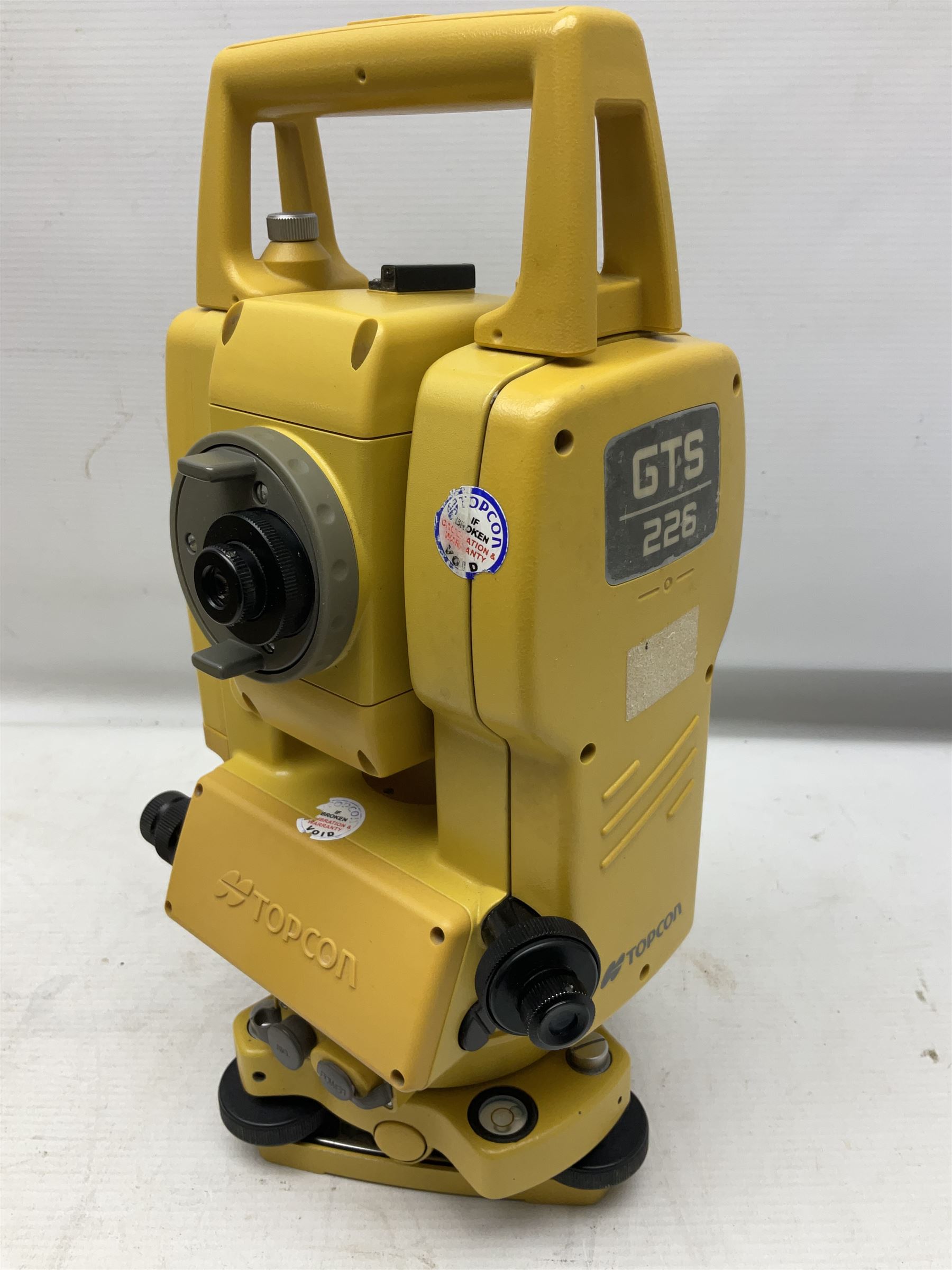 Topcon land surveying equipment - GTS 226 Electronic Total Station, serial no.UN4962; in carrying case with charger and spare battery; together with Leica tripod (2)
