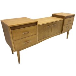 Mid-20th century oak drop-centre dressing table or sideboard, fitted with four drawers and central double cupboard, on tapering supports