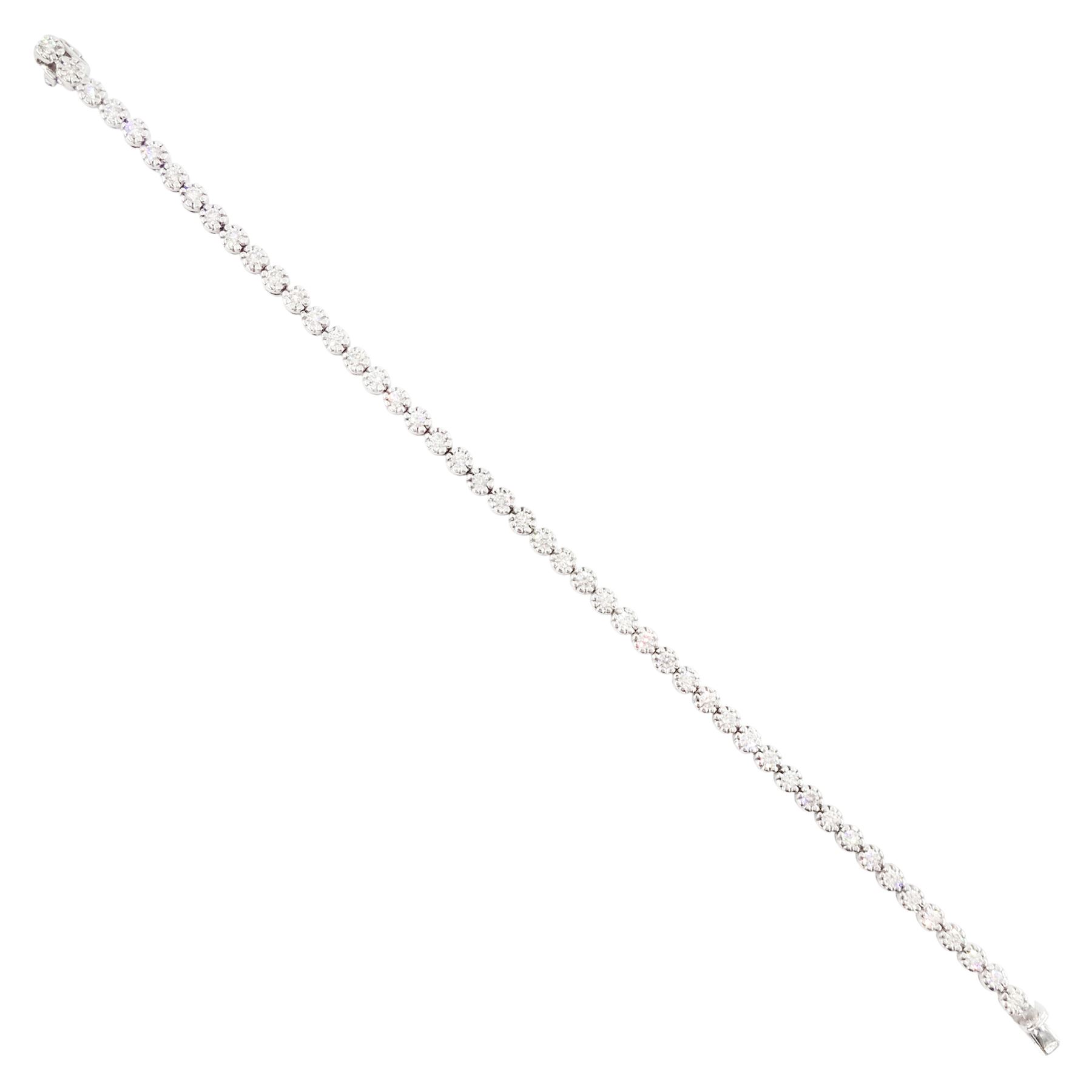 18ct white gold diamond bracelet, forty-eight round brilliant cut diamonds, in a bead setting, stamped 750, total diamond weight approx 2.50 carat