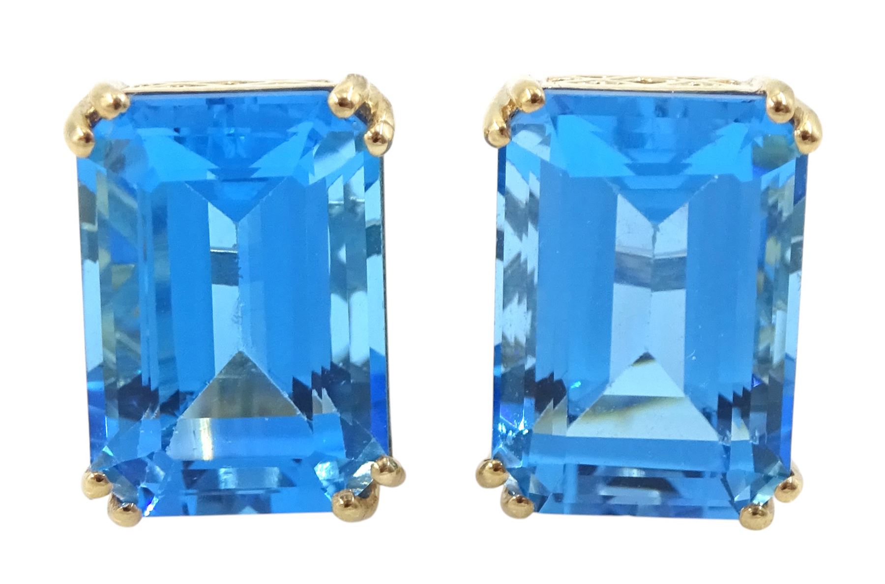 Pair of 9ct gold emerald cut blue topaz stud earrings, stamped, total topaz weight approx 16.05 carat